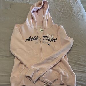Hollister Light Pink Zip-Up Hoodie with 'Athl Dept' Graphic